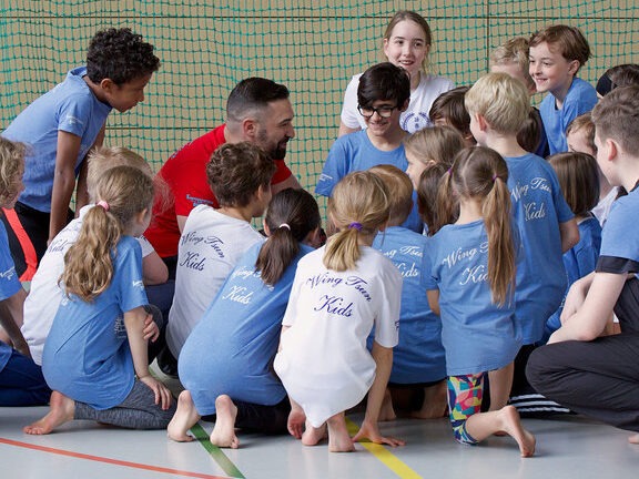 Kids Martial Arts - Children huddled together